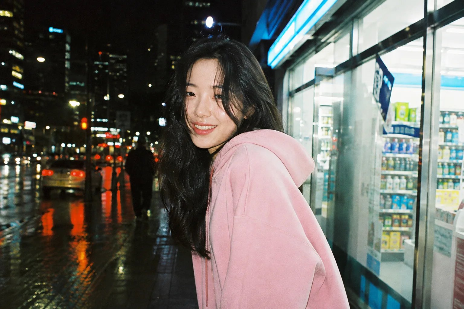 Authentic 35mm film street portrait outside a Seoul convenience store at midnight